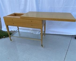 Mid Century Paul McCobb buffet/ serving table. Opens and slides over to create a large serving space. 