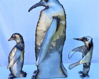 Metal penguin sculptures by: Howard Tomashek 