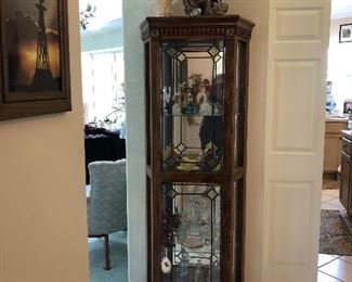 Narrow curio cabinet. Great for small spaces