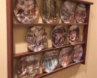 11 Collector plate set, plate rack is sold.