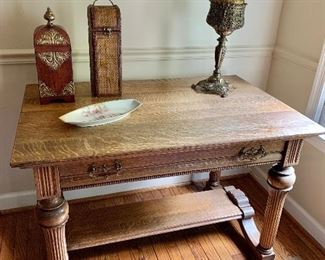 $250 Vintage Victorian style oak single drawer and shelf table. 28.5"H x 27.75"D x 42"W