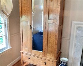 $295 Vintage oak, one drawer wardrobe with mirror front panel. 75.25"H x 17"D x 42"W