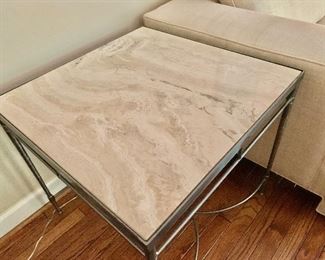 Detail; Pair of metal and travertine top end tables. One of two. 22"H x 24"W x 24"D