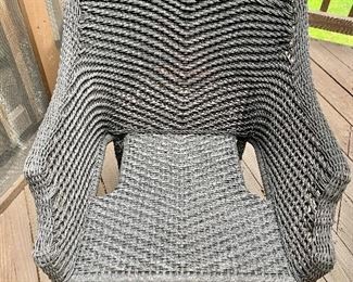 Crate & Barrel. Set of five resin wicker arm chairs.  34"H x 25"D x 24"W