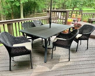 $400 Crate & Barrel chairs and cushions : 5 chairs, one is arm chair. $150  Unmarked Powder coated table; $145 Crate & Barrel umbrella and stand TABLE AND UMBRELLA/STAND ARE SOLD!