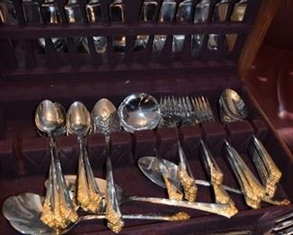 Stainless Oneida Flatware with Gold Rose Accents 12 Place Settings Plus Serving Pieces. Like New