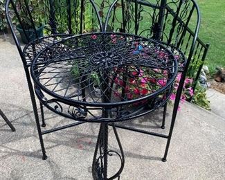 Wrought iron table and 2 chairs