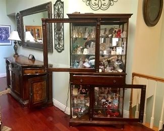 One of a kind rectangular rich dark wood curio cabinet with horizontal sliding doors and beveled glass your best stuff goes here