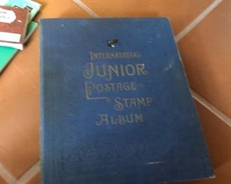 Junior Postage Stamp Album - very packed with stamps! 