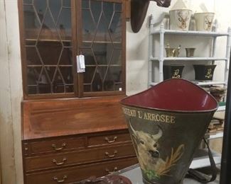 Antique secretary, English crests, French grape hods, bamboo shelves