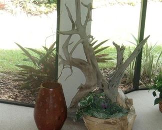 driftwood sculpture, pottery vase