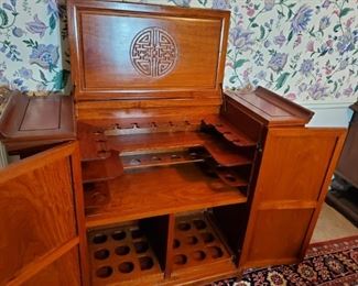 fancy liquor cabinet and bar