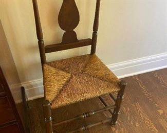 American country side chair with rush seat.  Baluster splat, flat crest rail.  New England, late 18th century 37"h  x 19"w x 15"d $120