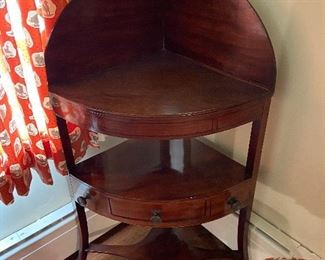 Mahogany corner table with three drawers and shelf.  Empire style - American- likely late 19th century.   25"w x 17"d x 42"h  $120