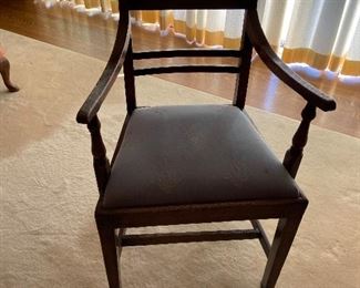 English country oak arm chair curved horizontal back plinths square tapered legs circa 1810. $60