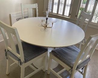 Tulip table 47.5" diameter x 29"h $280. chairs sold separately