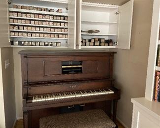 Vintage player piano (as found) and music rolls.  $250 or best offer