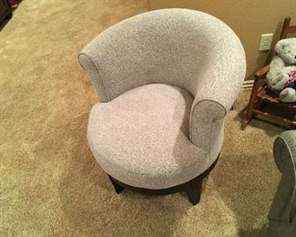 One of 2 Best Chair Company Round Swivel Chairs in Pristine New condition.