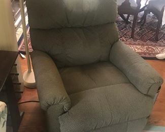Green Upholstered Recliner (head rest stain) $ 50.00