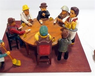 Reverse Marionette Of People Playing Poker, Arms Raise Up And Down As Barell Swings Below