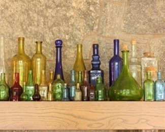 Lot of Multicolored Glass Bottles