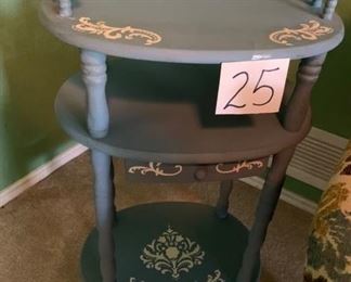 Dreamy blue chic side table designed  w carved wood, 3 tiers and drawer. Matches peg leg table. 31”T