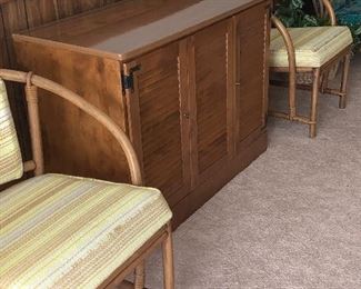 Rattan chairs and storage unit, console. 