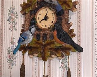 Small wall clock, bird theme.  