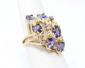 14K gold ring with diamonds and semi precious stones weighs 6.5g and a size 6