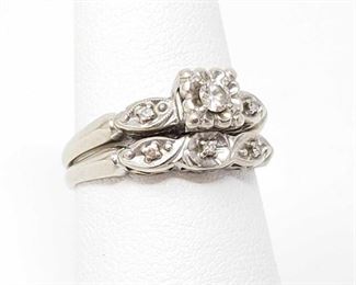 14 K Gold Wedding Ring Set With Diamonds 3.7g. The largest stone approx 1/16ct.