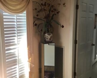 Mirrored Pedestal and Porcelain vase with arrangement