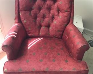 Upholstered swivel chair. Tufted back. Rust and gold sateen fabric with starburst design. Not perfect, but nice bones.