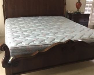 King sized bed with mattress set (can be sold separately). Beautiful solid wood. This is a massive and solid bed to use as a focal point. This bed is like new and owner purchased this bed for 3 times the amount asked.