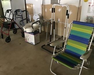 Various home medical equipment: potty seats, walkers, bed rails, wedge pillow, shower seat