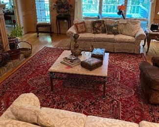 10’ x 13’ 100% wool rug in deep red with navy and cream.