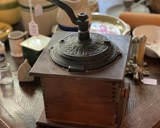 Vintage iron and wood coffee grinder