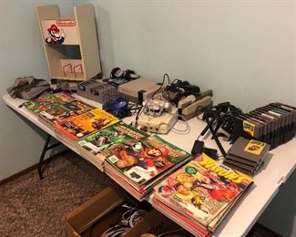 Old Gaming Systems in bedroom at end of hall