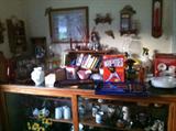 Pic showing more items on top of the depression era display cabinet