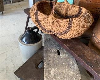 Old handwoven baskets, primitive benches, foot stools, old jugs
