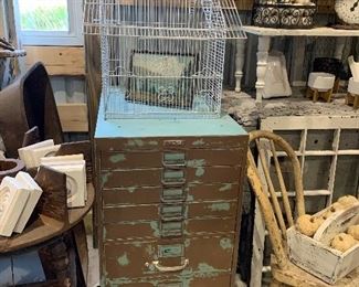 Vintage metal multi drawer cabinet with deep drawers, vintage wire bird cage for garden planting, antique chairs, vintage carrying caddys, woolen pumpkins