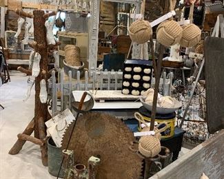 Antique Victorian mirrors, vintage enamel top table, large sawmill blades, Antique cast iron coat stand, nautical decor, vintage fencing sword, Old wire baskets, antique cobbler shoe molds
