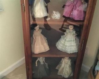 Dolls and cabinet