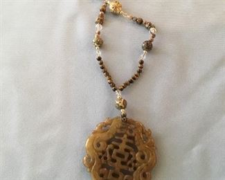 Carved jade necklace