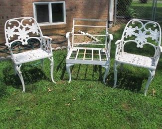 Vintage metal furniture includes: one large table, two smaller tables with glass tops, & chairs without cushions