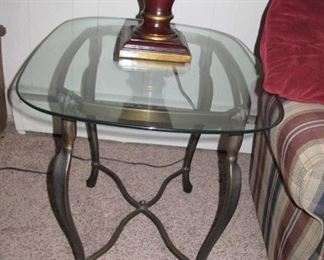 Glass top side table, one of two, burgundy lamp