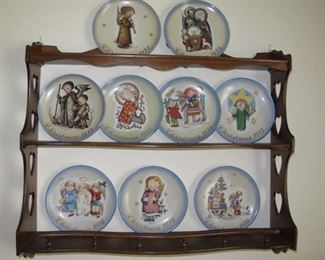 Hummel plate collection; maple display shelf