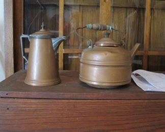 Copper pots, tea pot is "Buckley"