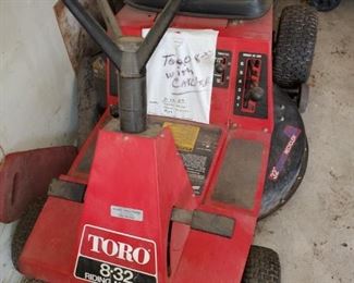 Toro, mower, garden tractor, with baggers . Needs battery.  Needs tune up 