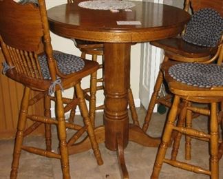 oak pub height table and 4 swivel chairs                                             BUY IT NOW $ 185.00