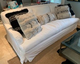 Most of the decorative pillows are sold. Sofa from Restoration Hardware.